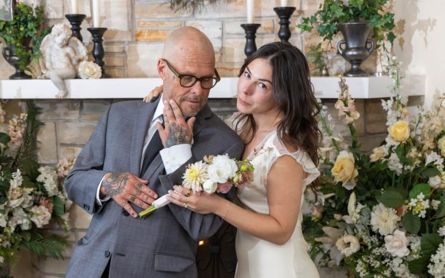 stone chapel cute couple in front of the hearth